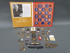 A quantity of military badges and insignia including British West Indies regiment example marked