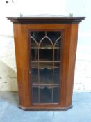 A 19thC astragal glazed mahogany hanging corner cupboard,