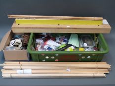 A large collection of largely new and unused archery accessories including bow shafts,
