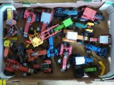 Twenty mainly Britains diecast model tractors including Massey Ferguson, Ford,