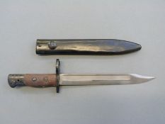 A jungle carbine Lee Enfield MK V bayonet and scabbard,