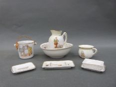A 19thC continental porcelain child's tea set with circus figures decoration