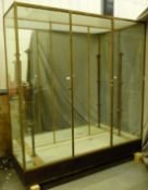 Ex Victoria & Albert Museum early 20thC glazed display cabinet with bronzed lock fitting impressed