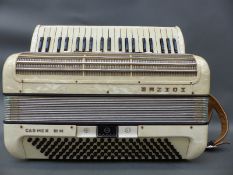 Hohner Carmen III M 120 bass piano accordion with nine treble couplers and three bass couplers,