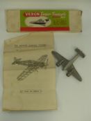 A trench art style aluminium twin engine aircraft,