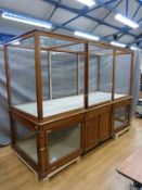 Ex Victoria & Albert Museum early 20thC mahogany three bay display cabinet with glazed upper