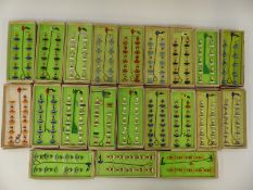 Twenty-one Subbuteo football teams all in original boxes together with various accessories.