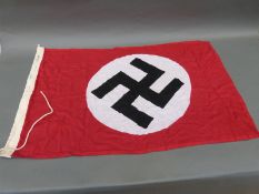 A likely replica depicting swastika and bearing date 1939