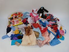 A large collection of Sindy and similar clothes and outfits