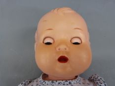 Five post war composition dolls to include a 'Reliable' girl doll in 1960's dress,