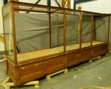 Ex Victoria & Albert Museum early 20thC mahogany four bay glass display cabinet with glazed upper