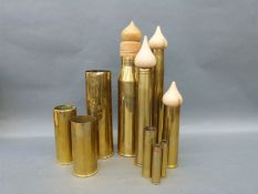Eight WWII and later brass shell cases, largest marked 18Pr,