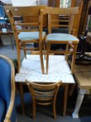 A c1950's /early 60's retro kitchen table with formica top and four chairs by SJD Derby