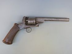 A 54 bore six-shot percussion revolver with ornately engraved frame, chequered grip,