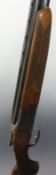 Laurona 12 bore over and under shotgun with florally engraved locks, top lever,