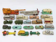 Twenty-one Dinky Toys and Dinky Supertoys diecast model vehicles including military, police,