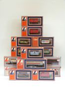 Fourteen Lima 00 gauge wagons, vans and tankers,