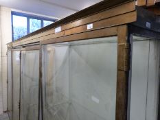 Ex Victoria & Albert Museum early 20thC four door glass display cabinet with bronzed frame.