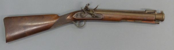 Davy flintlock hammer action blunderbuss with 13 inch sprung bayonet, named lock,