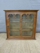 A small glazed display cabinet,