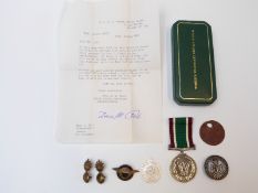 A cased Women's Voluntary Service medal,