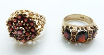 A 9ct gold ring set with garnets and another 9ct gold ring set with garnets in a cluster,