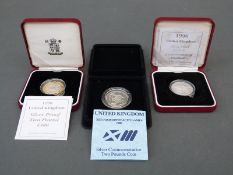 Three cased Royal Mint UK silver proof £2 coins comprising one 1996 Celebration of Football,