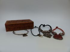 Four silver Indian necklaces including one set with mother of pearl,