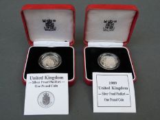 Two cased Royal Mint UK silver proof Piedfort £1 coins, one for 1988, the other 1989,