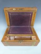 Late 19th / early 20thC writing slope with brass bound decoration,