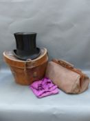 A silk top hat in fitted leather case, the hat with label for Scott and Co, Piccadilly, London,