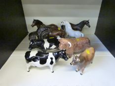 A collection of Beswick animals including Welsh Mountain pony, Dartmoor, Friesian,