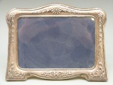 A modern hallmarked silver mounted photograph frame to suit 4 x 6 inch photograph,