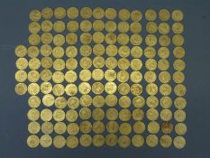 A large collection of Victorian counters in the form of 1788 spade guineas