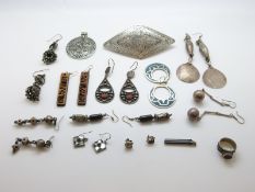 A collection of white metal Indian/ Eastern earrings etc