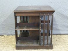 A oak revolving bookcase top