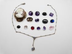 Four synthetic purple sapphires, a smoky quartz, two banded agate cabochons,