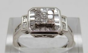 An 18ct white gold ring set with square and baguette cut diamonds, size O,