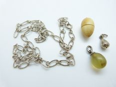 An ivory egg pendant with screw top, L20 x W11mm,