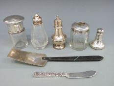 A quantity of hallmarked silver and white metal items to include hallmarked pepper,