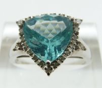 A 9ct white gold ring set with apatite surrounded by diamonds, size O/P, 3.