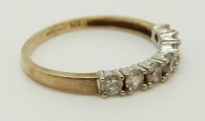 A 9ct gold rings set with diamonds in a cluster and a 9ct gold ring set with cubic zirconia (size L