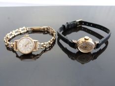 Two ladies wristwatches, one Avia 9ct gold with gold hands and baton markers, silver face,