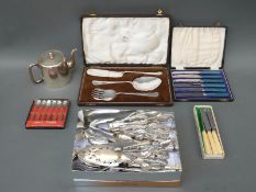 A quantity of cased and loose plated cutlery including a Walker & Hall serving set,
