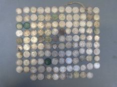 Over 110 silver 3d pieces,