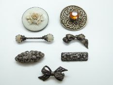 Two silver brooches set with marcasite in the form of bows,