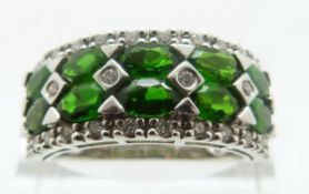 An 18ct white gold ring set with Russian diopside and diamonds, size O, 7.