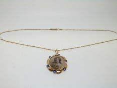 A Victorian 9ct rose gold open locket and chain,