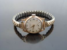 Eton 18ct gold ladies wristwatch with subsidiary seconds dial, gold hands and arrow markers,