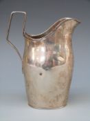 A Russian white metal jug, with Russia 84 silver marks for St Petersburg,